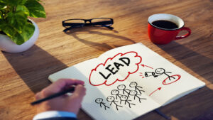 Geração de lead sendo representada em um desenho simples em mesa de escritorio